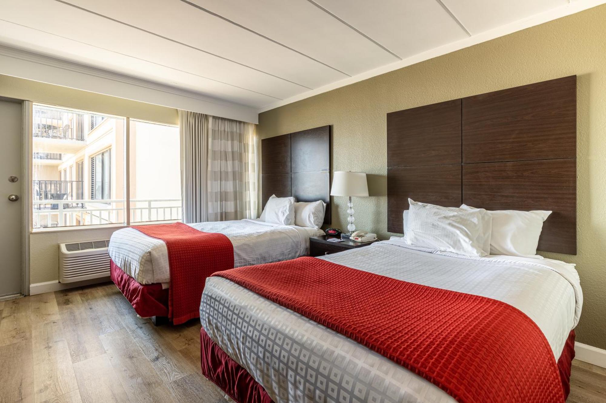 Room with Two Double Beds - Partial Ocean View