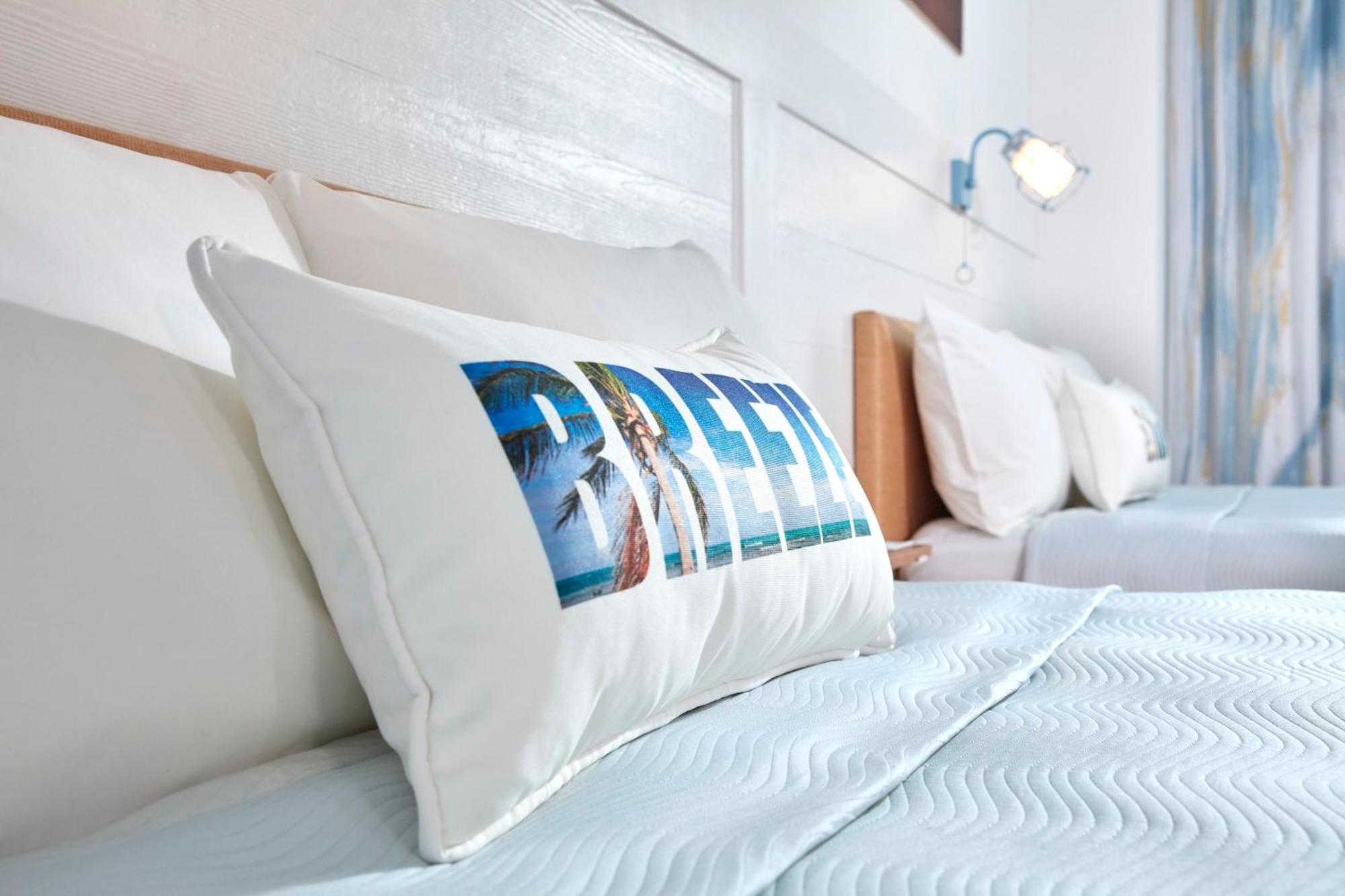 Two-Bedroom Suite Pool View with Roll-In Shower Mobility Accessible (Includes Early Park Admission*)