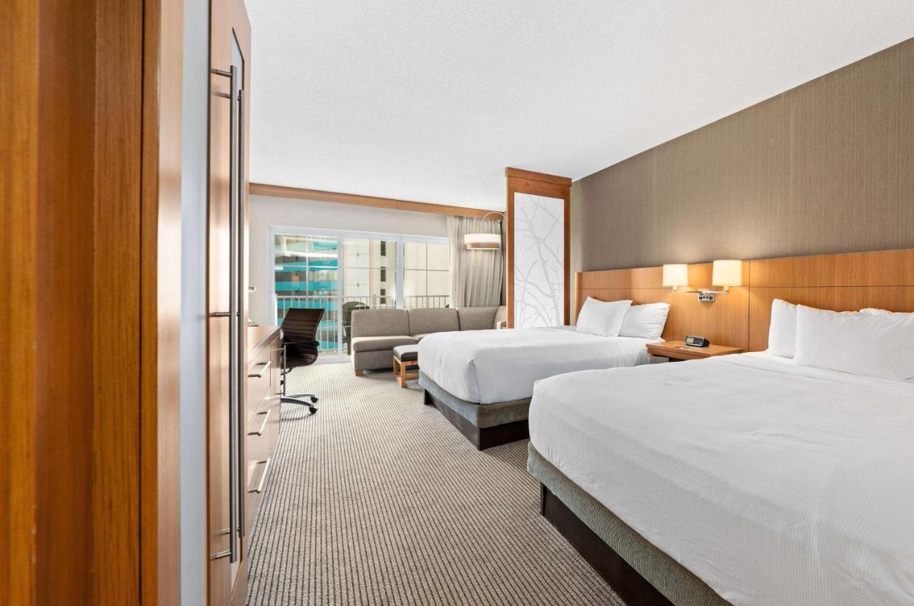 Queen Room with Two Queen Beds and Roll-In Shower - Partial Ocean View