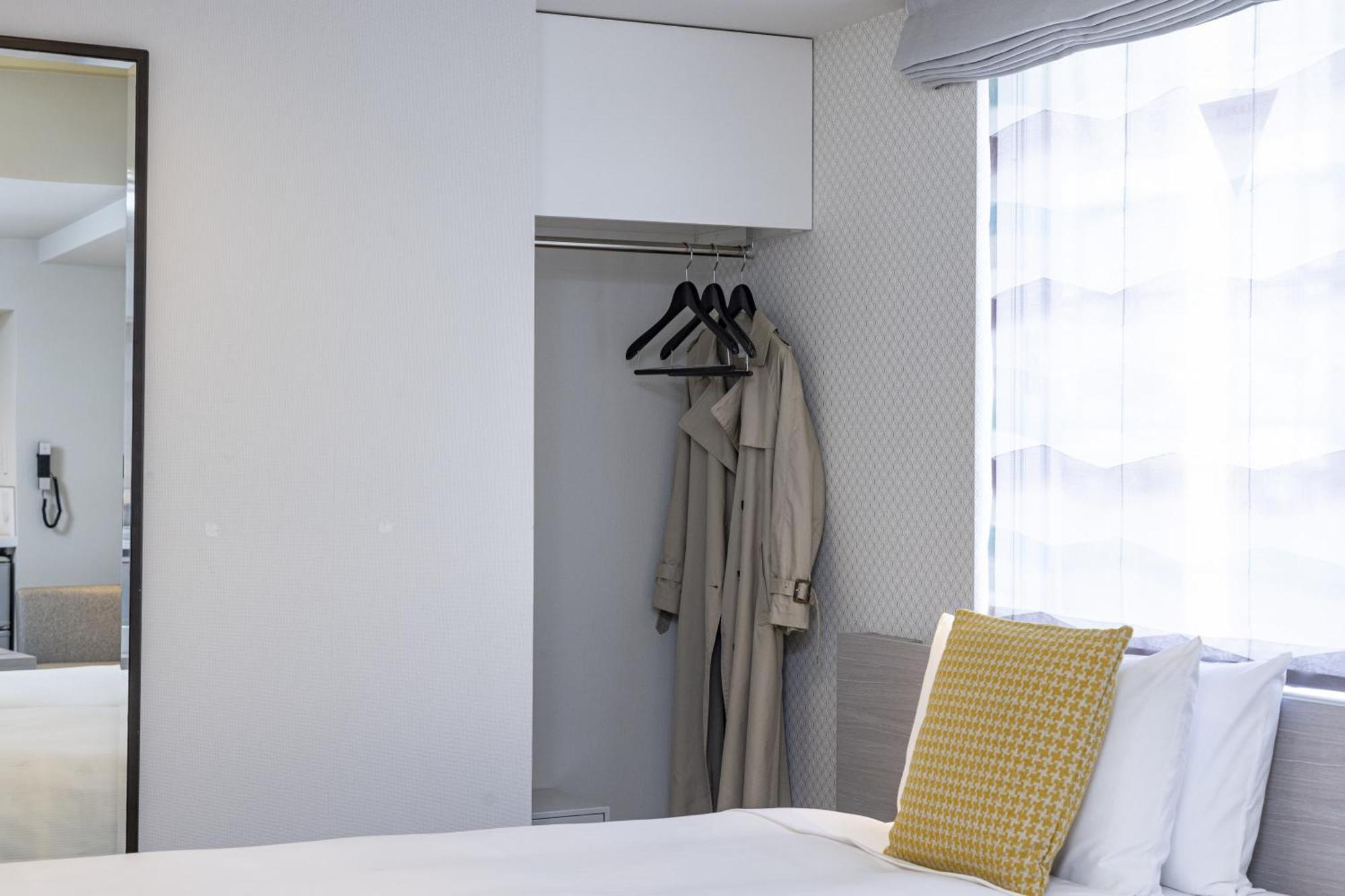 Superior Twin Room and In-room  Washer-Dryer 3Adult