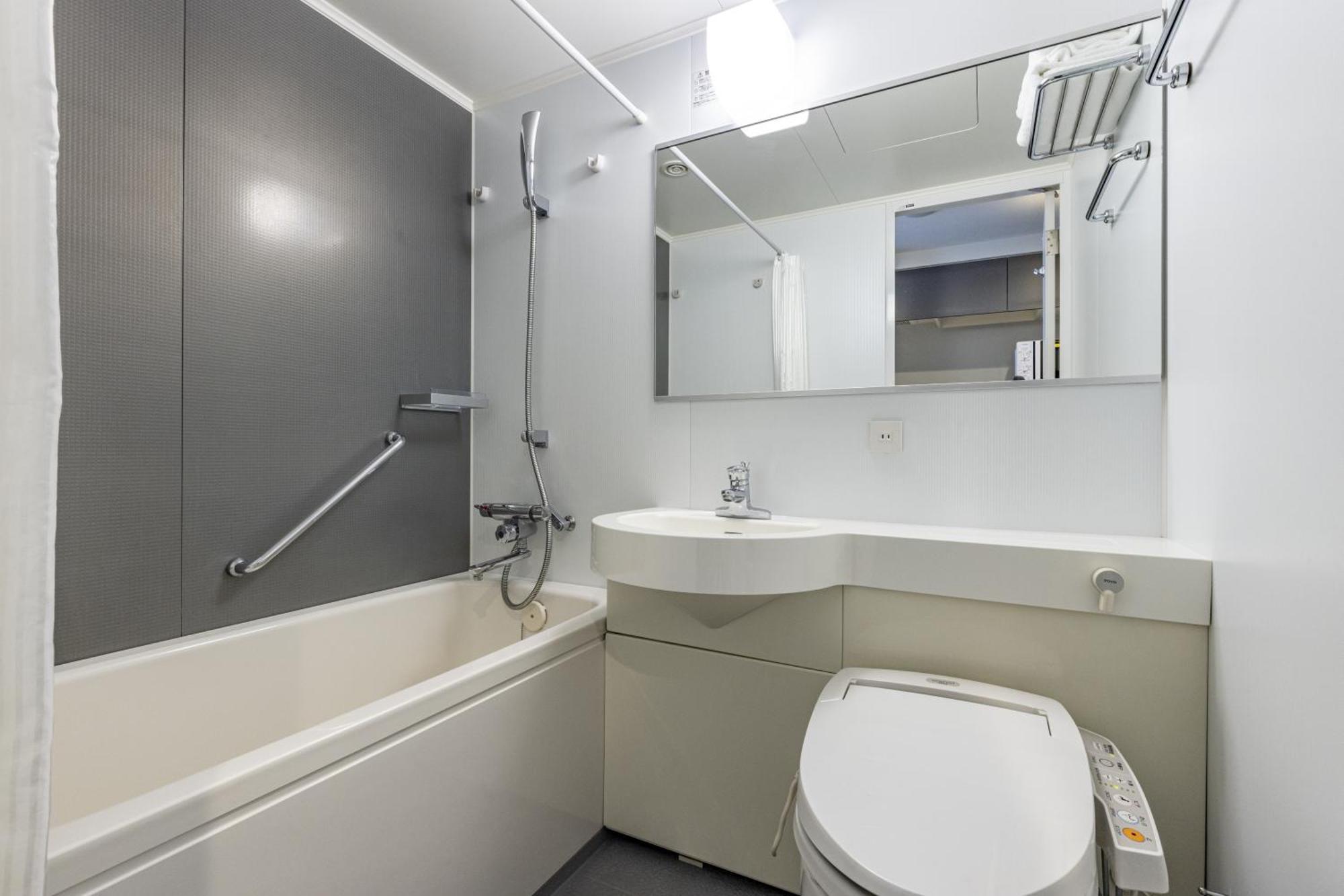 Moderate Double Room with 55 in Bed and In-room Washer-Dryer 1-2Adult
