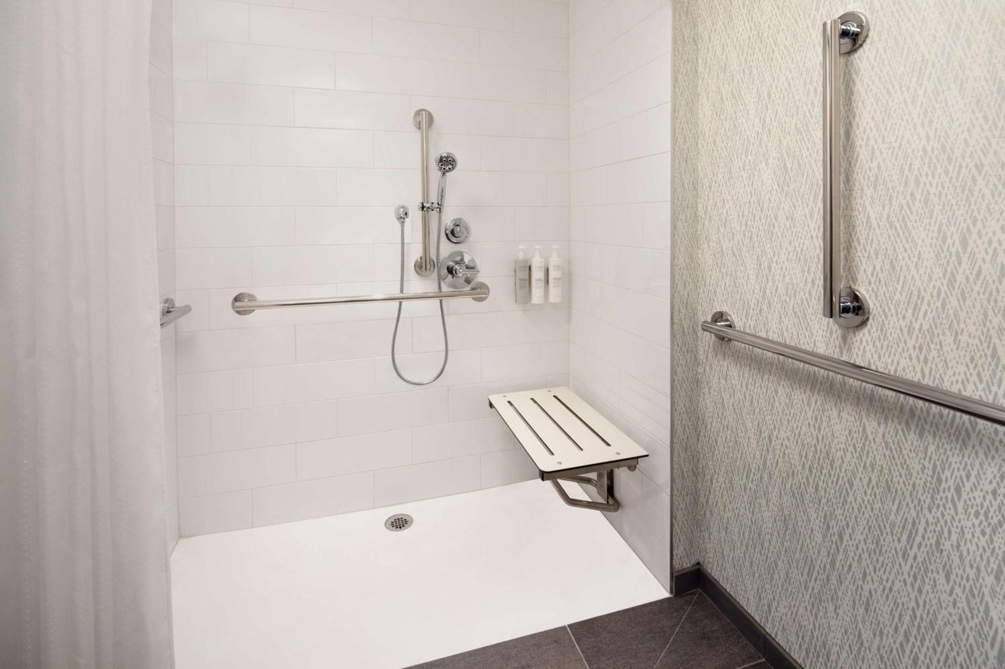 Corner Queen Room with Roll-In Shower - Mobility Access,1596293123:JPEG