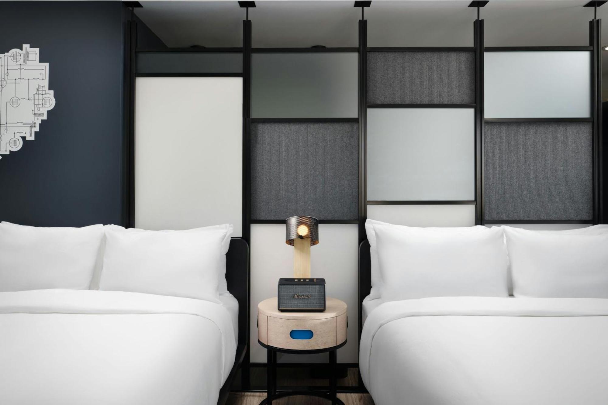 Larger Queen Room with Two Queen Beds and City View