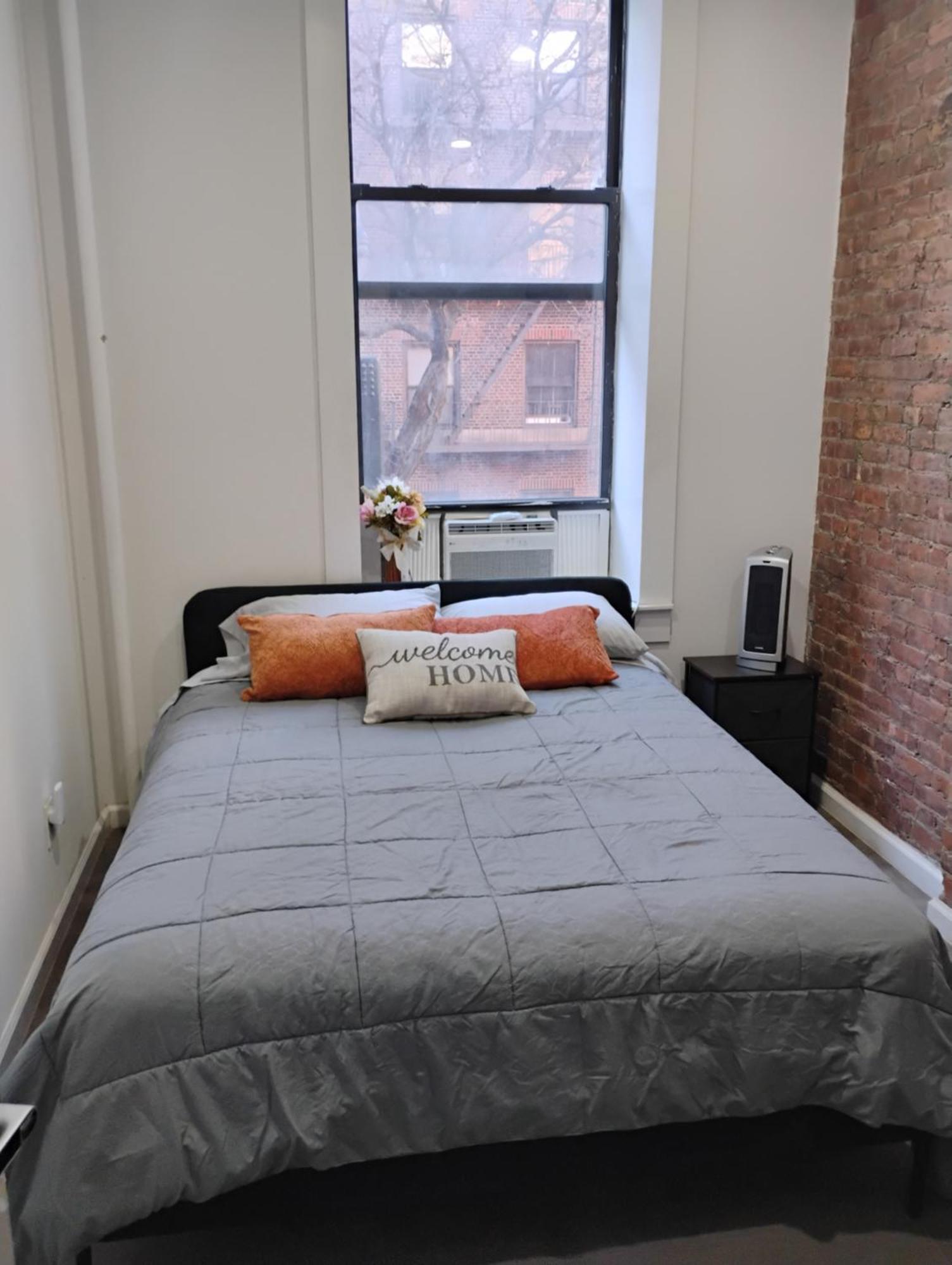 Queen Room with Shared Bathroom