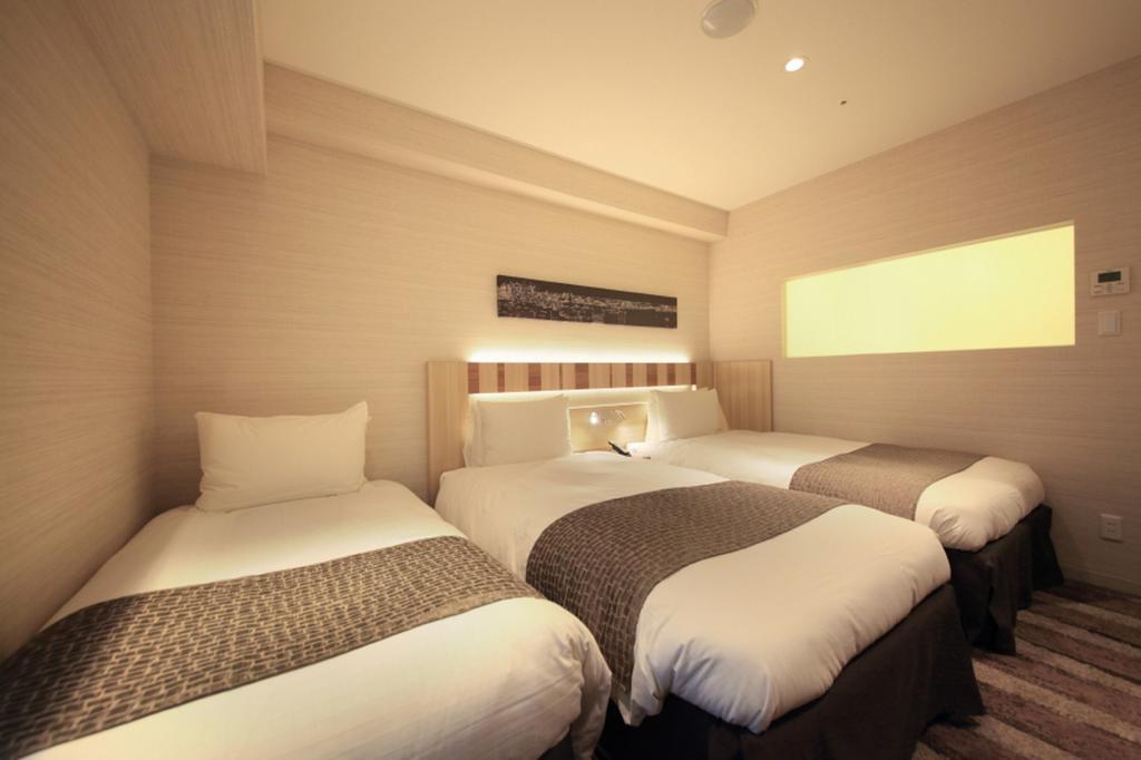 Twin Room with Extra Bed - Non-Smoking,182388291:JPEG