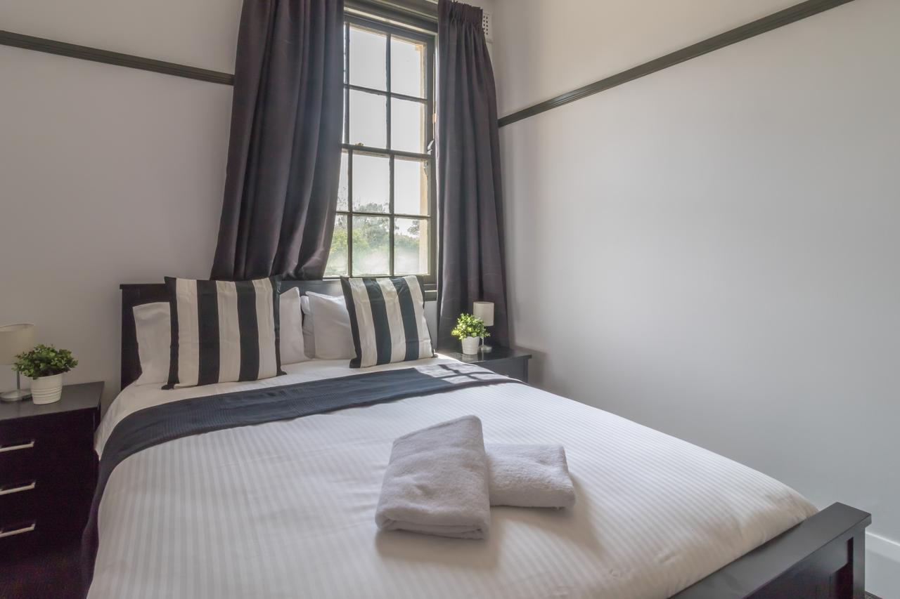 Queen Room with Shared Bathroom